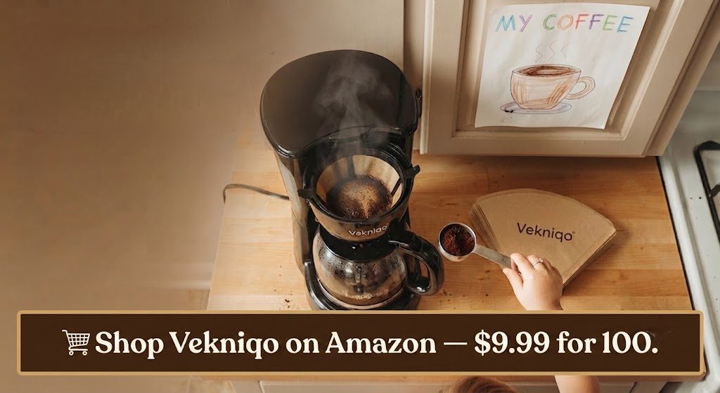 Vekniqo coffee filters on a counter next to a brewing coffee maker with a child's hand and drawing